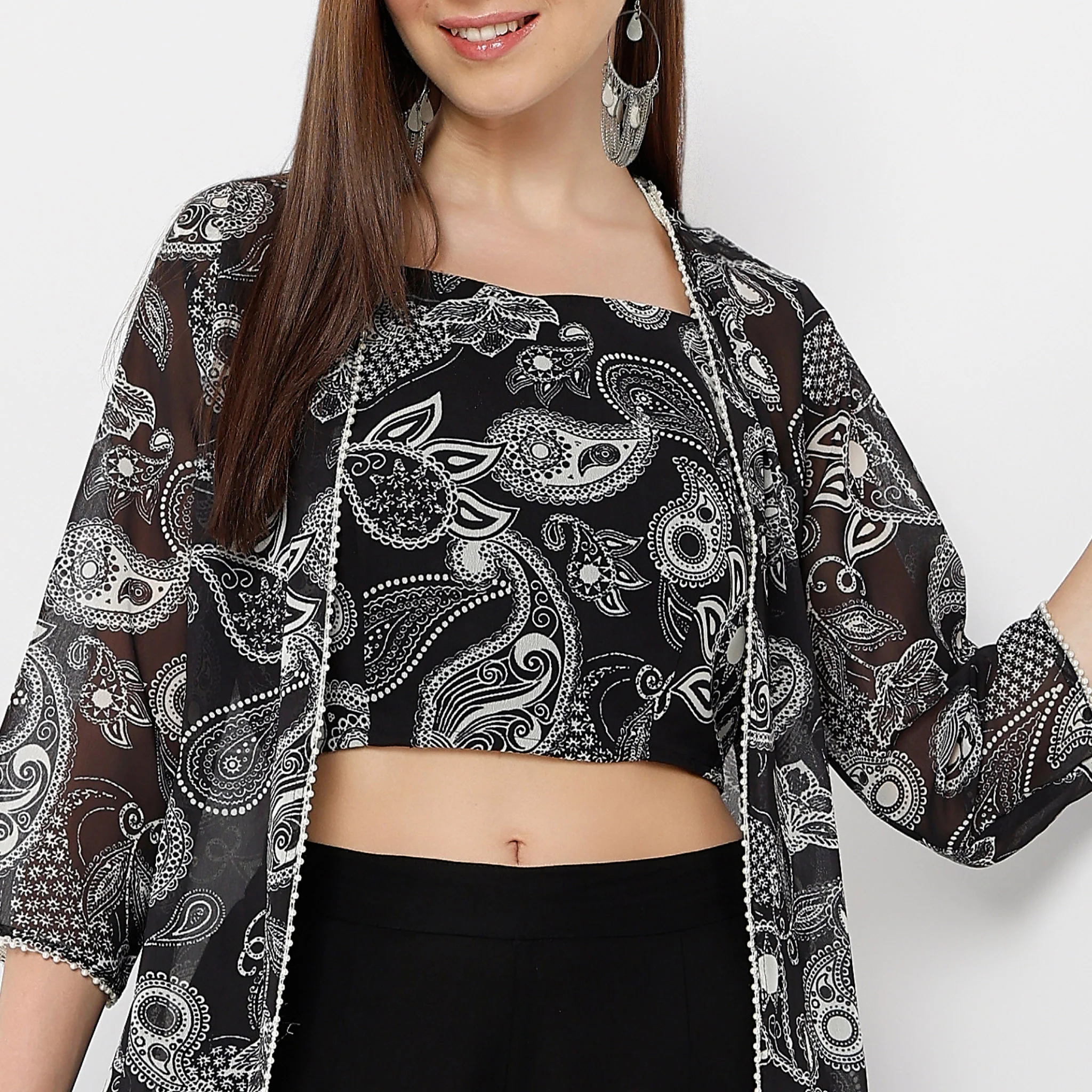 Printed Square Neck Speghetti Crop Top With Three-Fourth Sleeve Calf Length Flare Fit Shrug And Solid Pallazo Co-Ords - Image 4